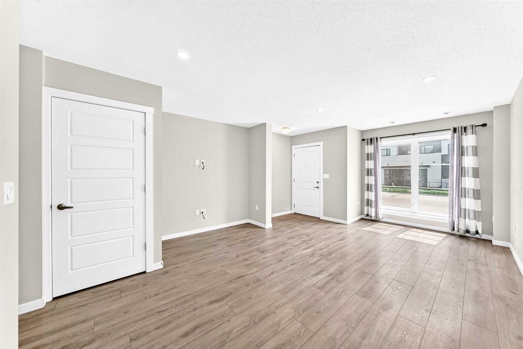 220 Red Embers Way Ne, Calgary, AB - Indoor Photo Showing Other Room