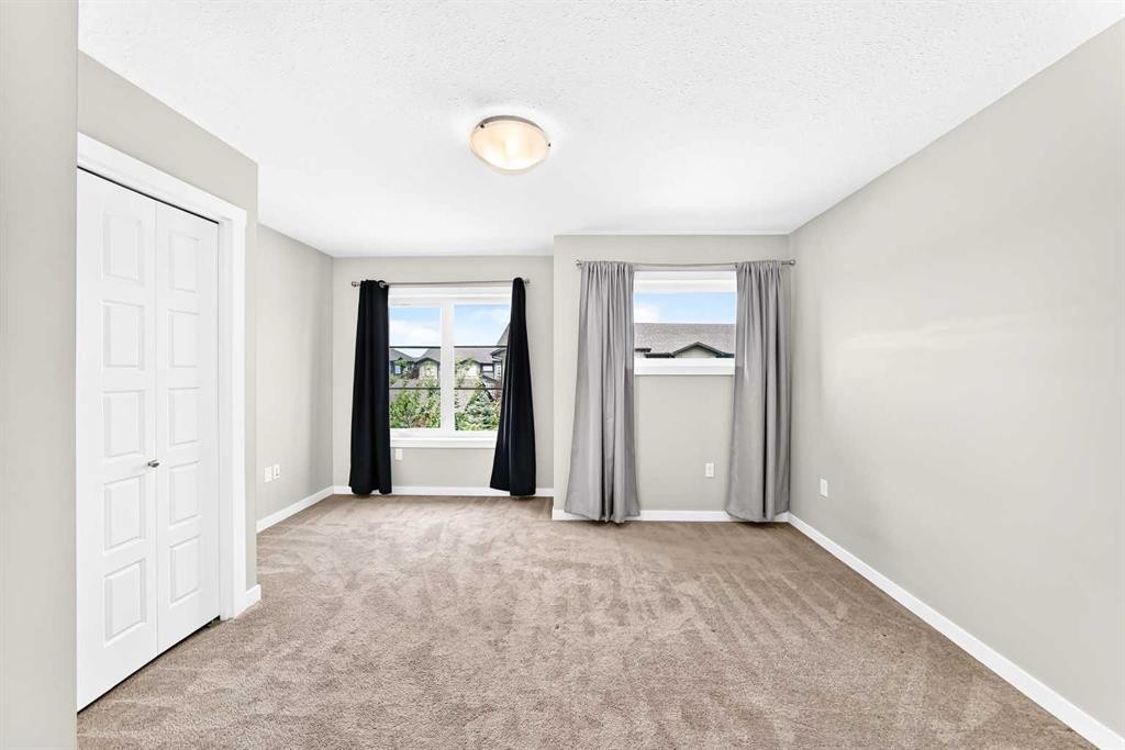 220 Red Embers Way Ne, Calgary, AB - Indoor Photo Showing Other Room