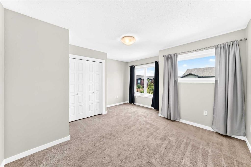 220 Red Embers Way Ne, Calgary, AB - Indoor Photo Showing Other Room