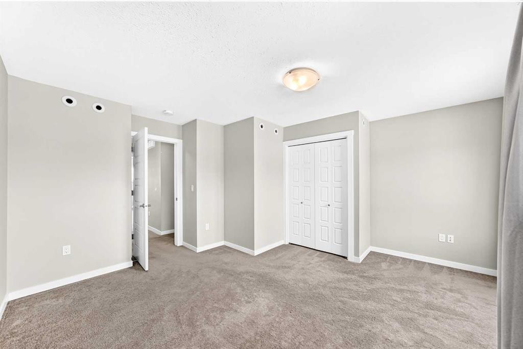 220 Red Embers Way Ne, Calgary, AB - Indoor Photo Showing Other Room