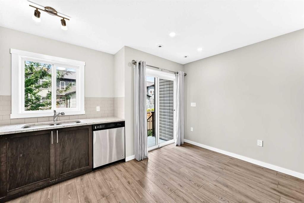 220 Red Embers Way Ne, Calgary, AB - Indoor Photo Showing Kitchen With Double Sink