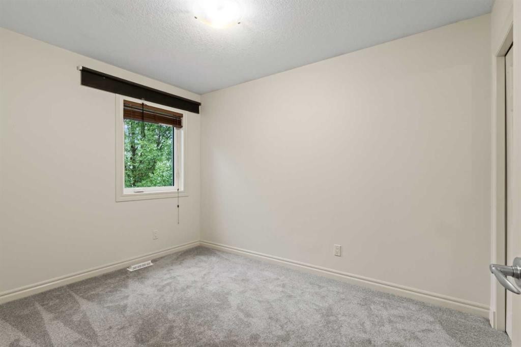 126 Chapman Close Se, Calgary, AB - Indoor Photo Showing Other Room