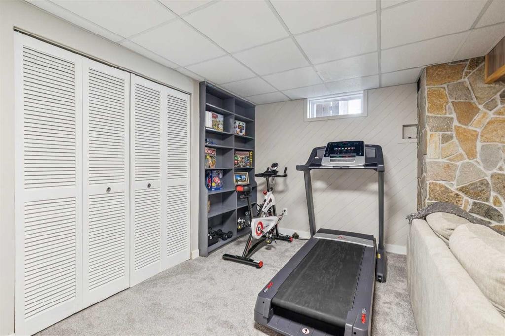 241 Allan Crescent Se, Calgary, AB - Indoor Photo Showing Gym Room