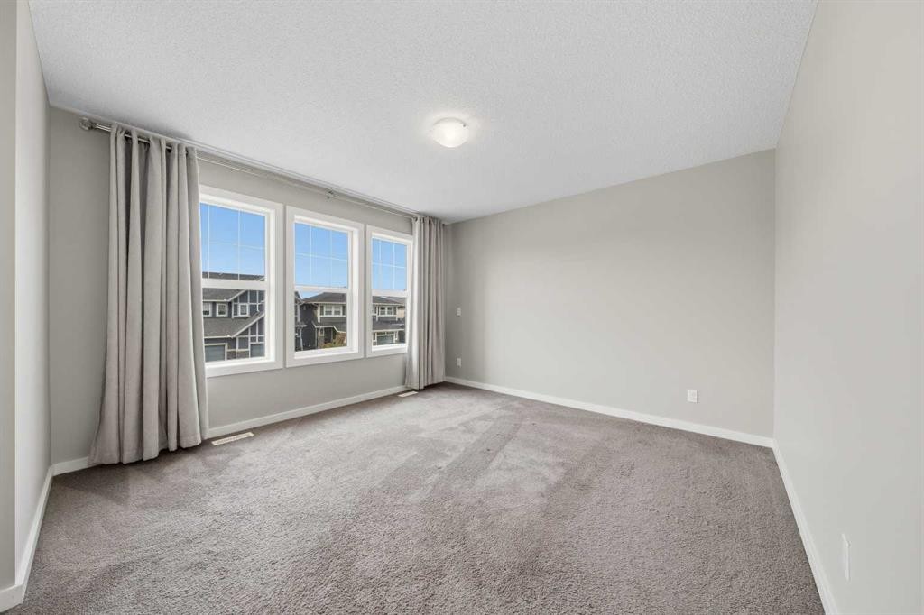 75 Legacy Glen Row Se, Calgary, AB - Indoor Photo Showing Other Room