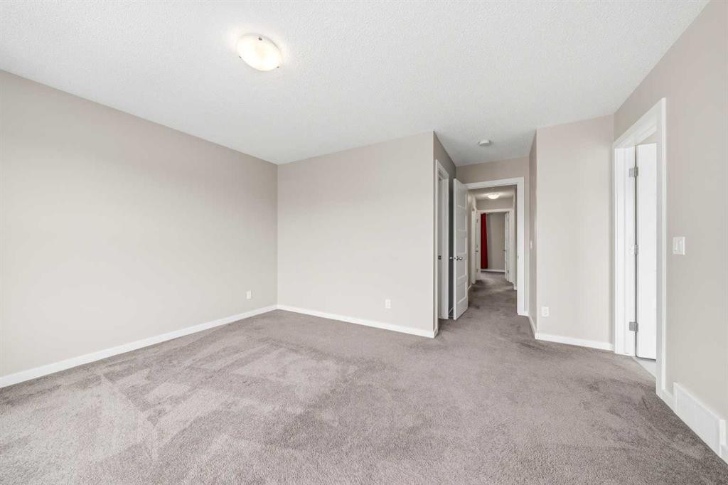 75 Legacy Glen Row Se, Calgary, AB - Indoor Photo Showing Other Room