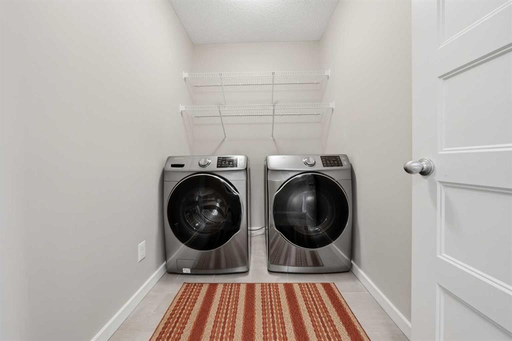 75 Legacy Glen Row Se, Calgary, AB - Indoor Photo Showing Laundry Room