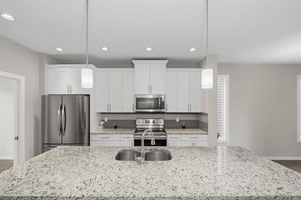 75 Legacy Glen Row Se, Calgary, AB - Indoor Photo Showing Kitchen With Stainless Steel Kitchen With Double Sink With Upgraded Kitchen