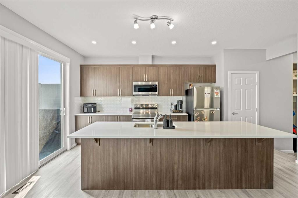 260 Carringham Way Nw, Calgary, AB - Indoor Photo Showing Kitchen With Stainless Steel Kitchen With Upgraded Kitchen