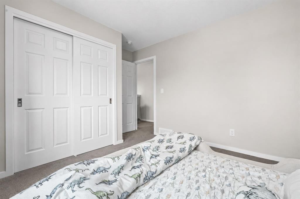 260 Carringham Way Nw, Calgary, AB - Indoor Photo Showing Bedroom