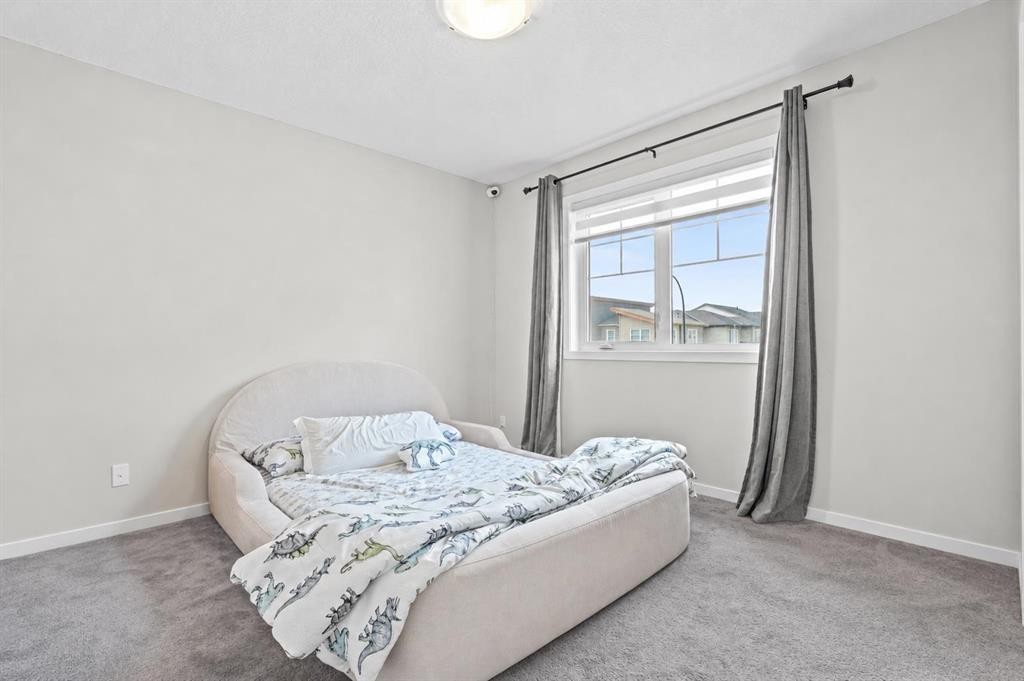 260 Carringham Way Nw, Calgary, AB - Indoor Photo Showing Bedroom