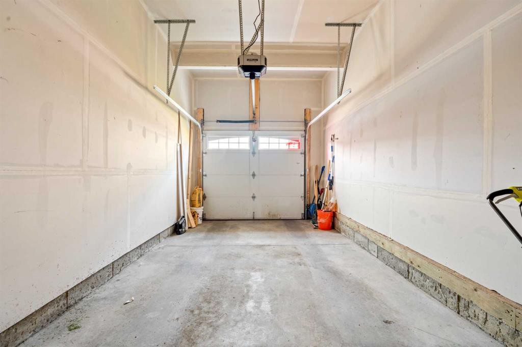 260 Carringham Way Nw, Calgary, AB - Indoor Photo Showing Garage