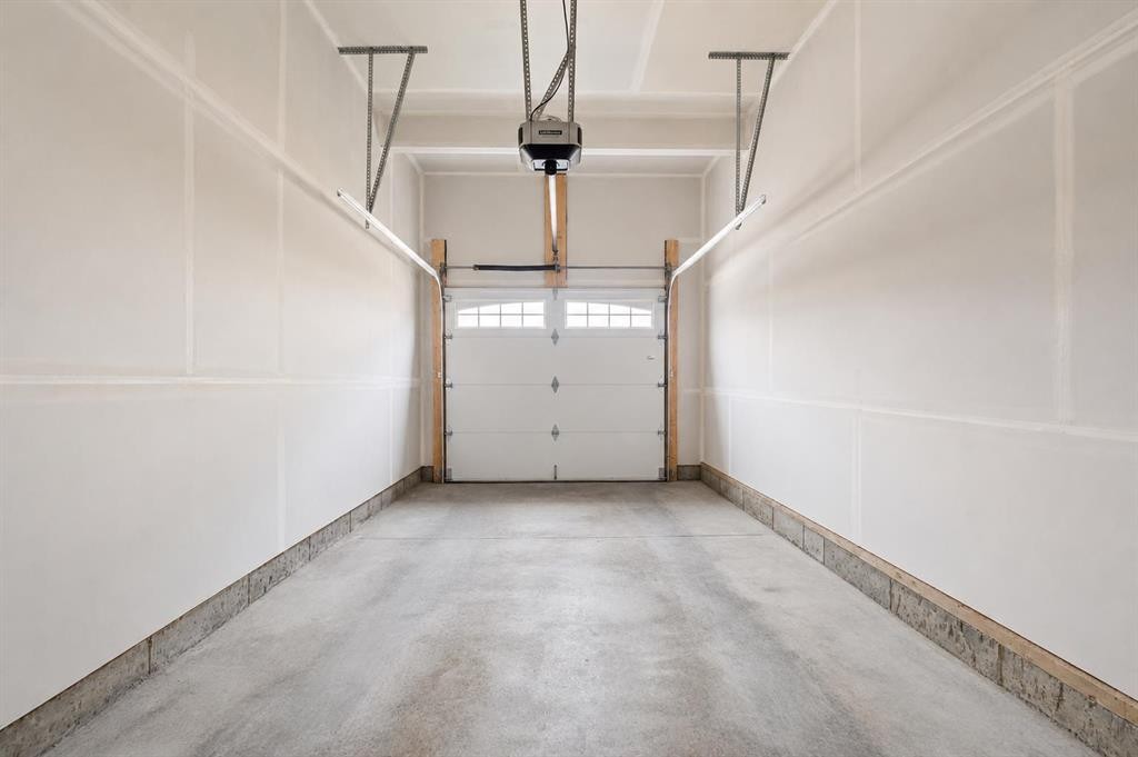 260 Carringham Way Nw, Calgary, AB - Indoor Photo Showing Garage
