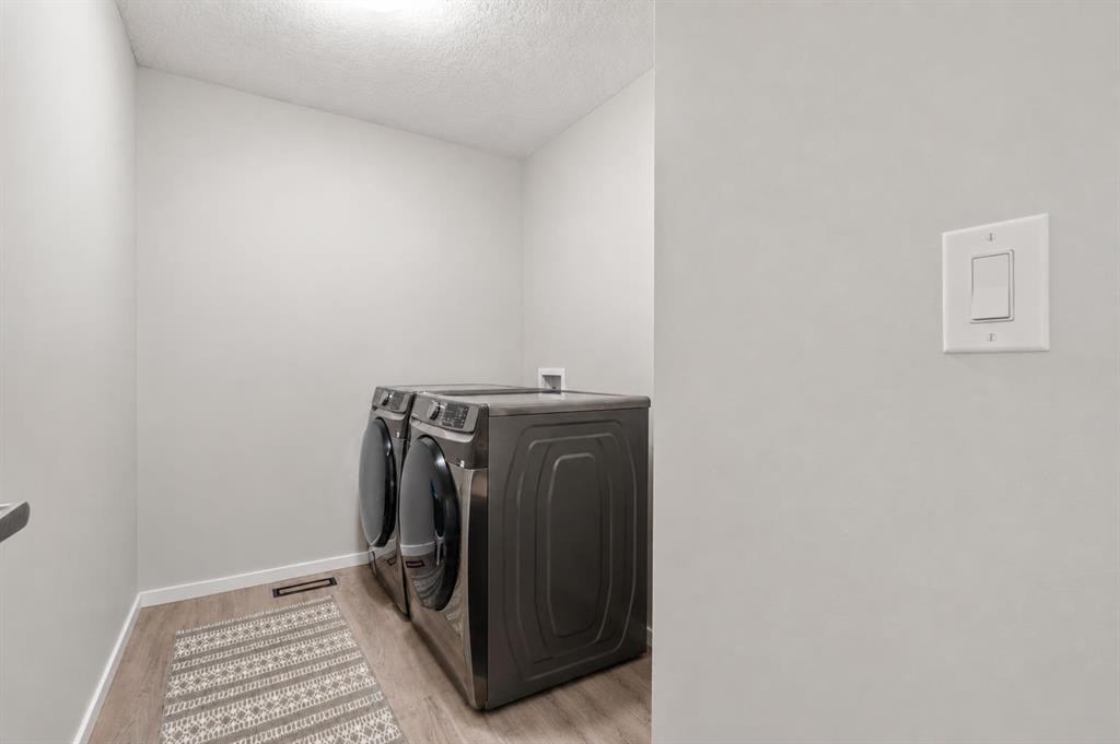 260 Carringham Way Nw, Calgary, AB - Indoor Photo Showing Laundry Room
