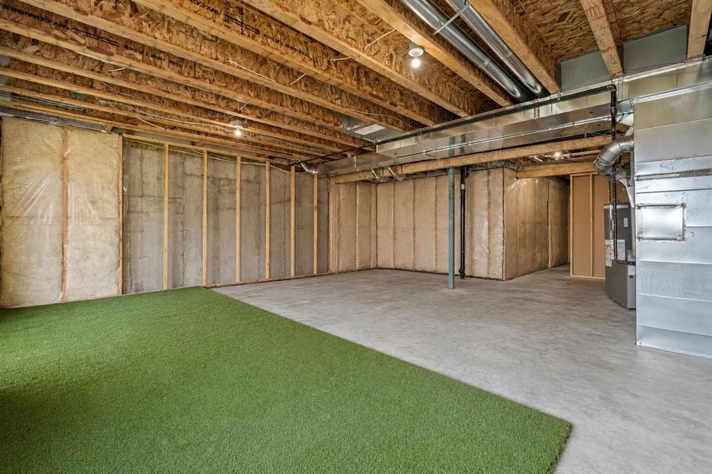 260 Carringham Way Nw, Calgary, AB - Indoor Photo Showing Basement