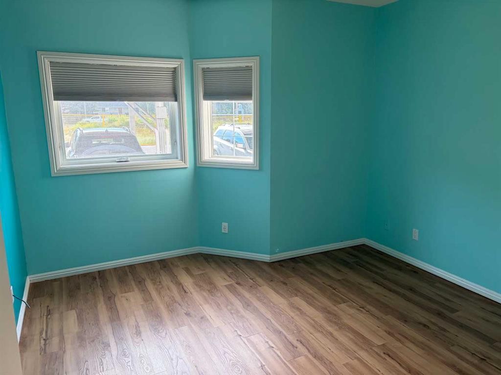 101-7 Lineham Avenue, Okotoks, AB - Indoor Photo Showing Other Room