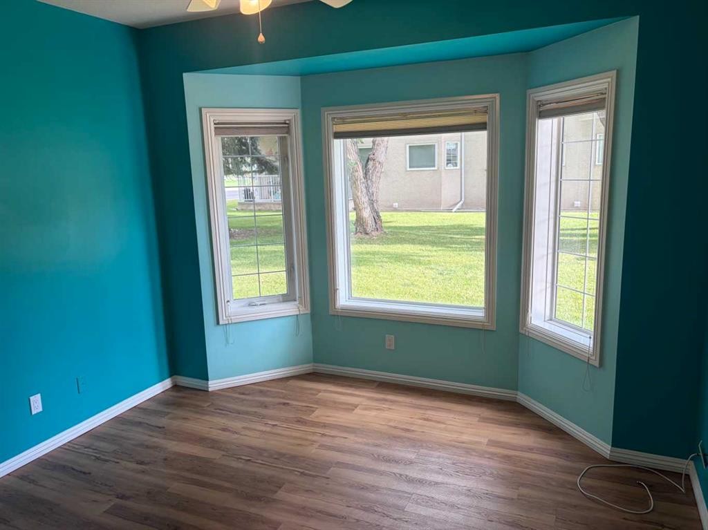 101-7 Lineham Avenue, Okotoks, AB - Indoor Photo Showing Other Room