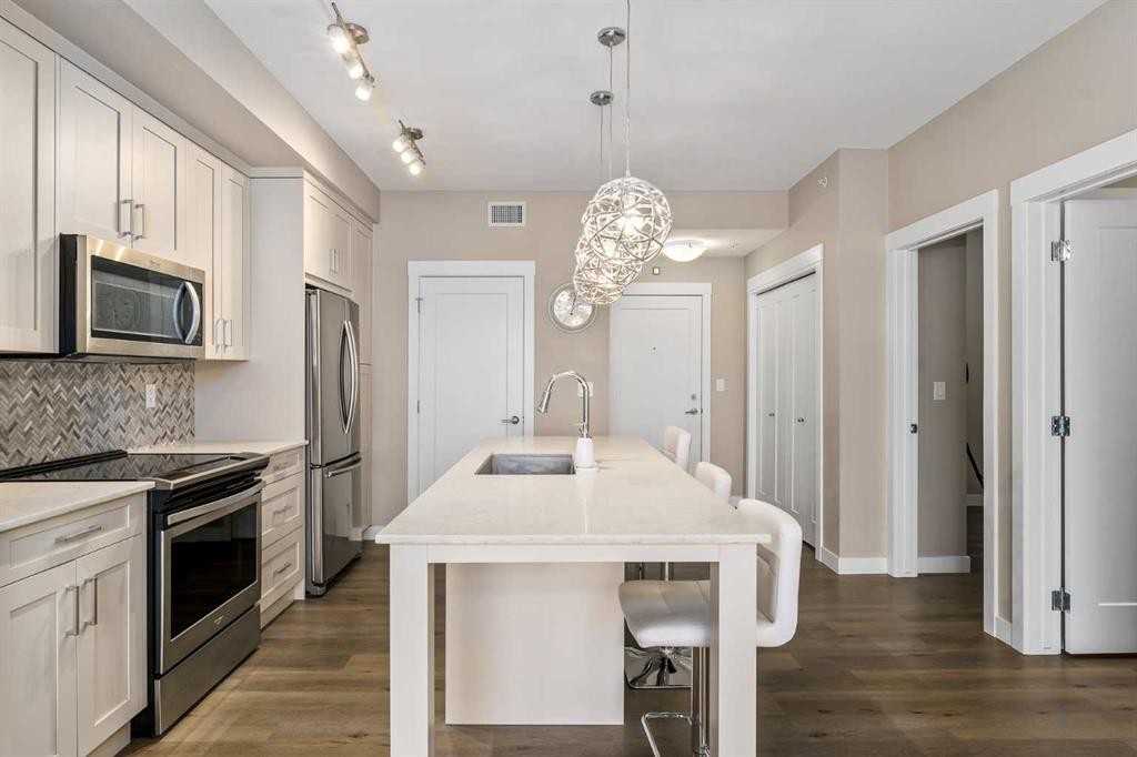 410-35 Walgrove Walk Se, Calgary, AB - Indoor Photo Showing Kitchen With Stainless Steel Kitchen With Upgraded Kitchen