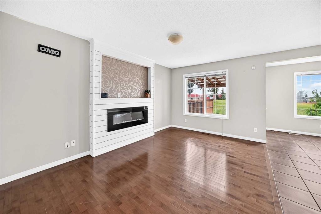 195 Taralake Way, Calgary, AB - Indoor Photo Showing Living Room With Fireplace