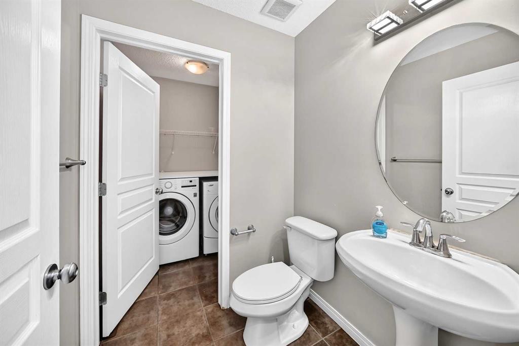 195 Taralake Way, Calgary, AB - Indoor Photo Showing Laundry Room
