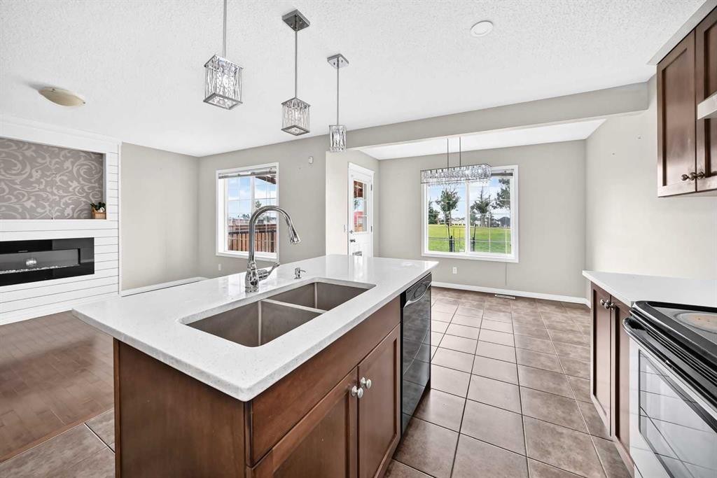 195 Taralake Way, Calgary, AB - Indoor Photo Showing Kitchen With Double Sink