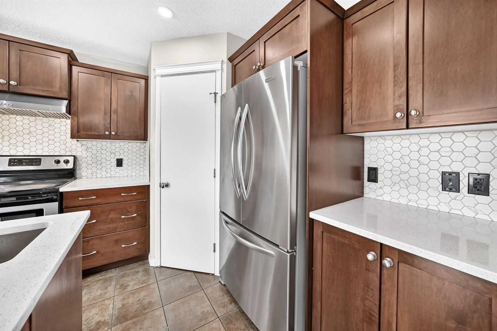 195 Taralake Way, Calgary, AB - Indoor Photo Showing Kitchen With Stainless Steel Kitchen With Upgraded Kitchen
