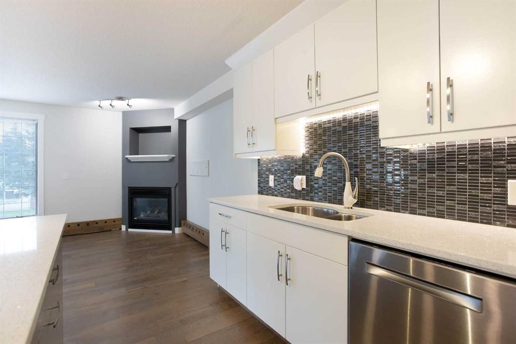 239-8535 Bonaventure Drive Se, Calgary, AB - Indoor Photo Showing Kitchen With Double Sink
