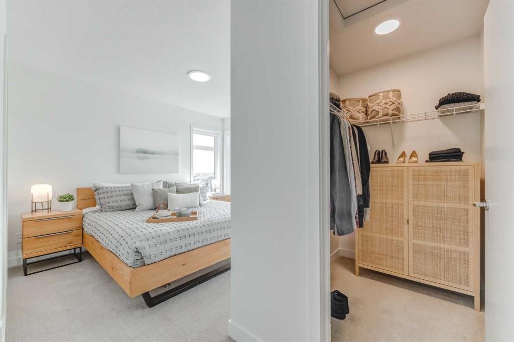 839 Belmont Drive Sw, Calgary, AB - Indoor Photo Showing Bedroom