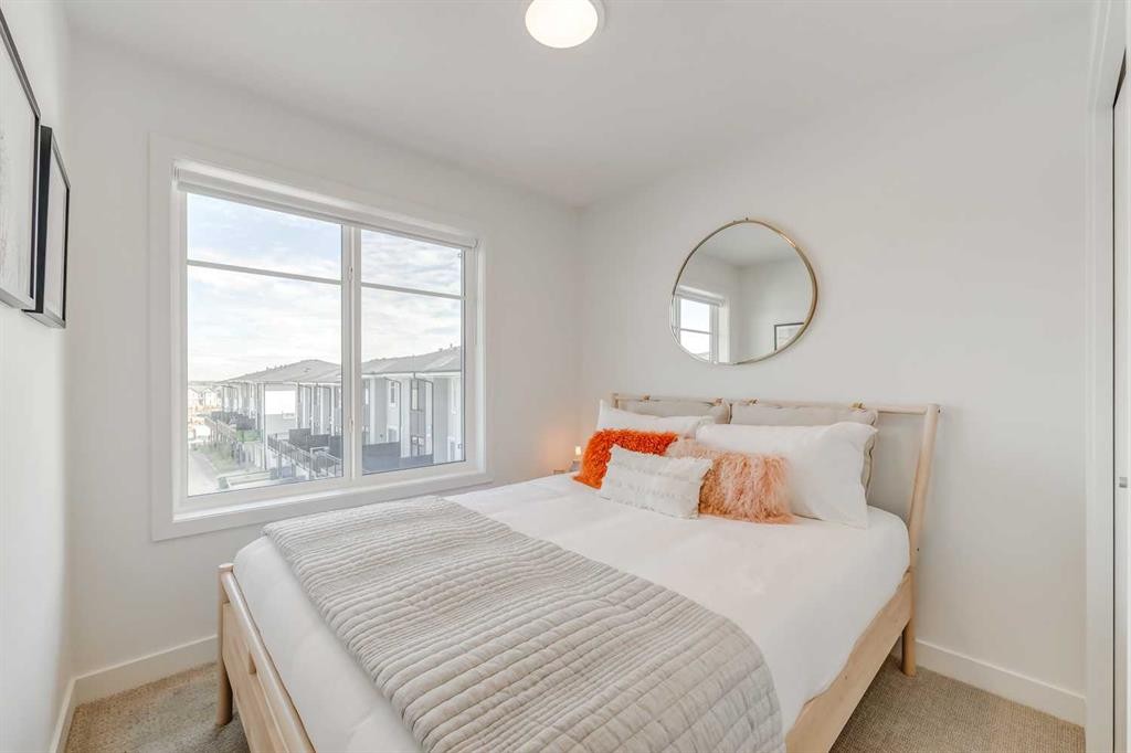 839 Belmont Drive Sw, Calgary, AB - Indoor Photo Showing Bedroom