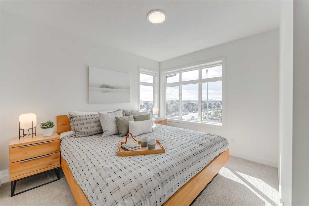 839 Belmont Drive Sw, Calgary, AB - Indoor Photo Showing Bedroom