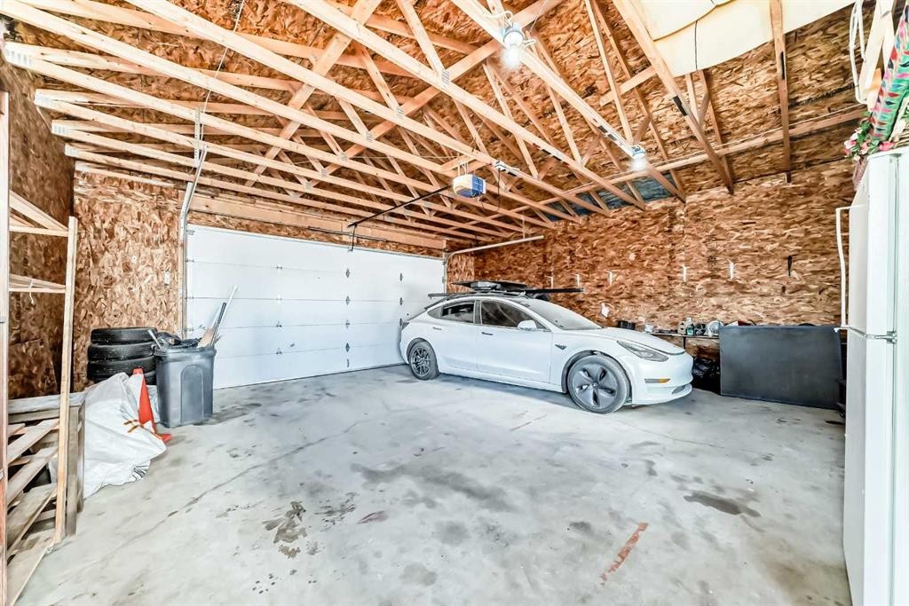 52 Taralake Street Ne, Calgary, AB - Indoor Photo Showing Garage