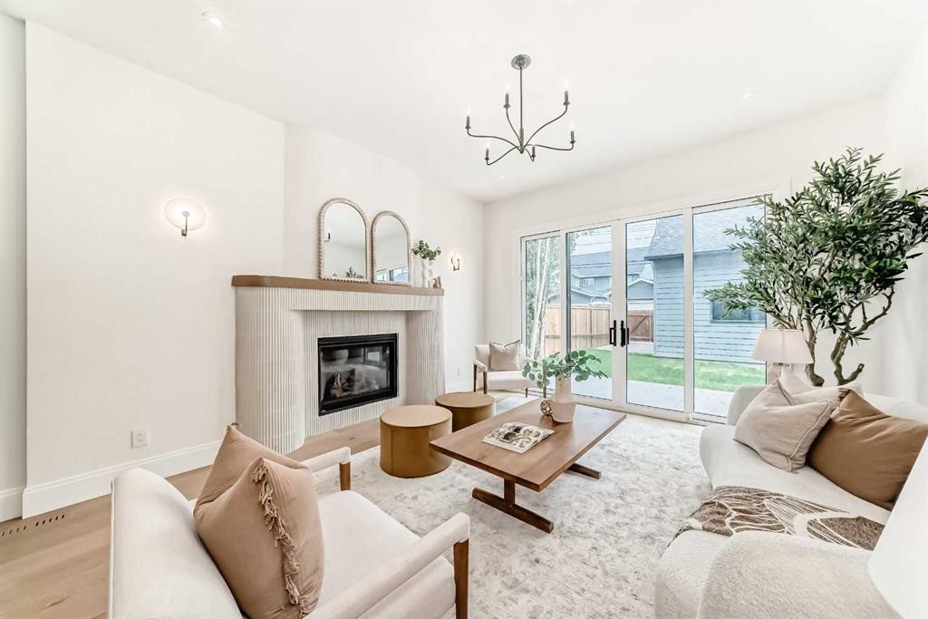 1612 49 Avenue Sw, Calgary, AB - Indoor Photo Showing Living Room With Fireplace