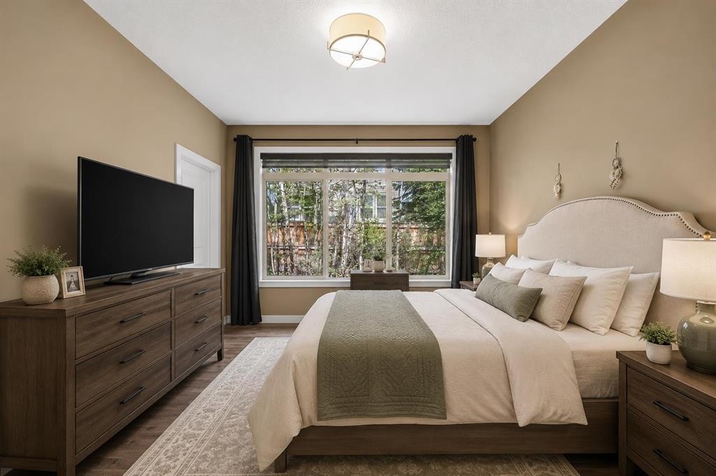 63 Cortina Villas Sw, Calgary, AB - Indoor Photo Showing Bedroom