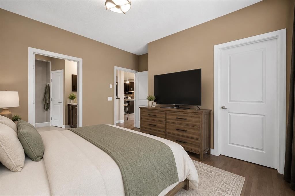63 Cortina Villas Sw, Calgary, AB - Indoor Photo Showing Bedroom