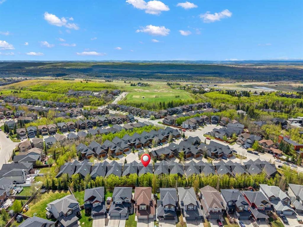 63 Cortina Villas Sw, Calgary, AB - Outdoor With View