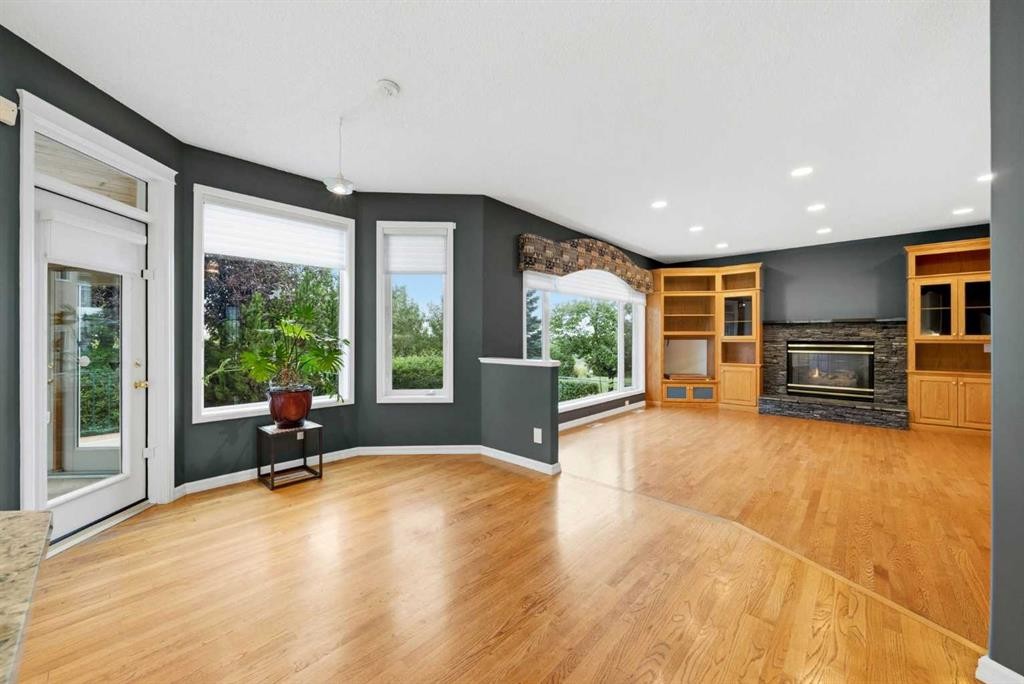 250 Diamond Drive Se, Calgary, AB - Indoor Photo Showing Living Room With Fireplace