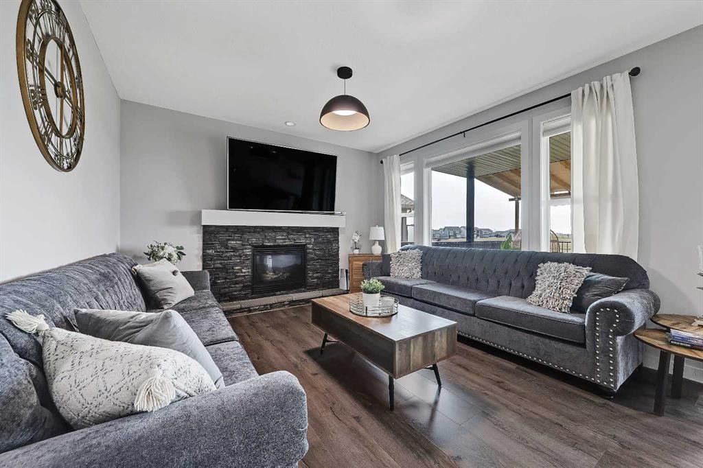268 Rainbow Falls Way, Chestermere, AB - Indoor Photo Showing Living Room With Fireplace