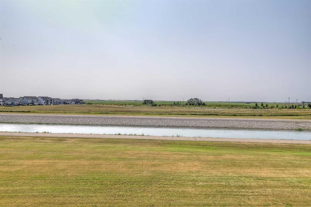 268 Rainbow Falls Way, Chestermere, AB - Outdoor With Body Of Water With View