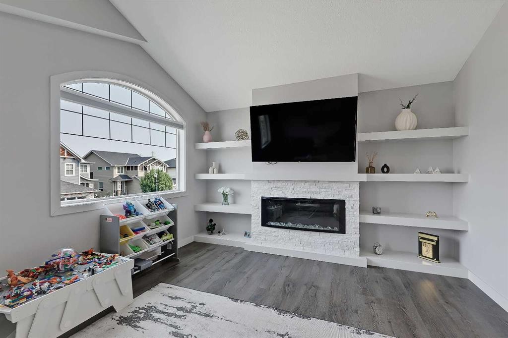 268 Rainbow Falls Way, Chestermere, AB - Indoor With Fireplace