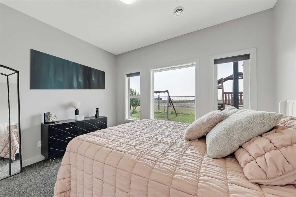 268 Rainbow Falls Way, Chestermere, AB - Indoor Photo Showing Bedroom