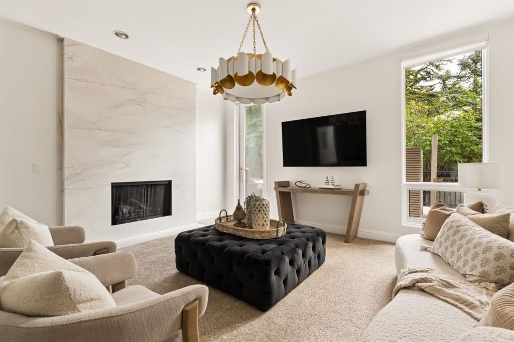 79 Bel-Aire Place Sw, Calgary, AB - Indoor Photo Showing Living Room With Fireplace