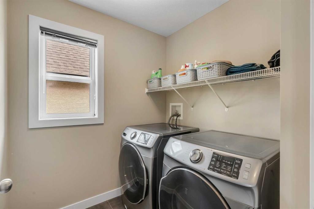 360 Marquis Heights Se, Calgary, AB - Indoor Photo Showing Laundry Room