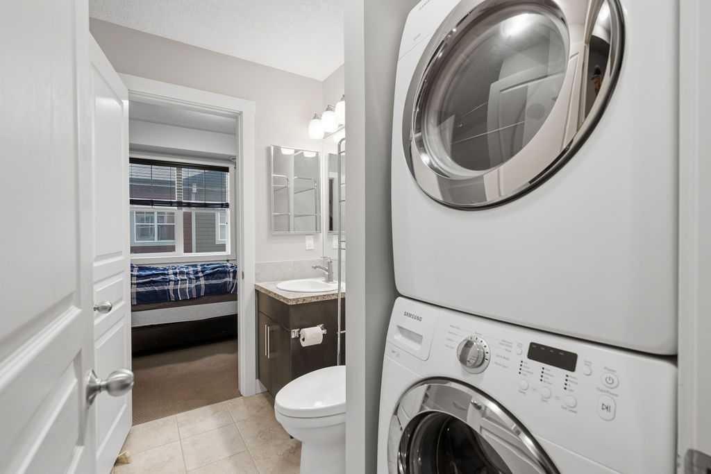 218 Cranford Walk Se, Calgary, AB - Indoor Photo Showing Laundry Room