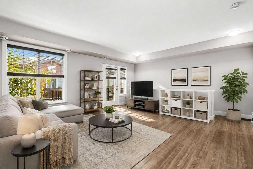 218 Cranford Walk Se, Calgary, AB - Indoor Photo Showing Living Room