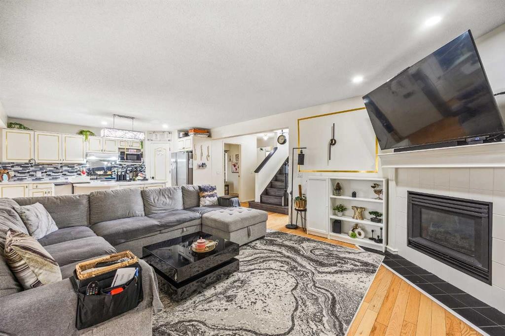 58 Citadel Crest Circle Nw, Calgary, AB - Indoor Photo Showing Living Room With Fireplace