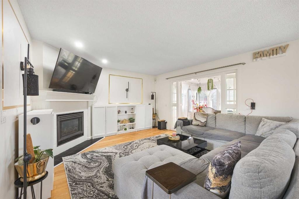 58 Citadel Crest Circle Nw, Calgary, AB - Indoor Photo Showing Living Room With Fireplace