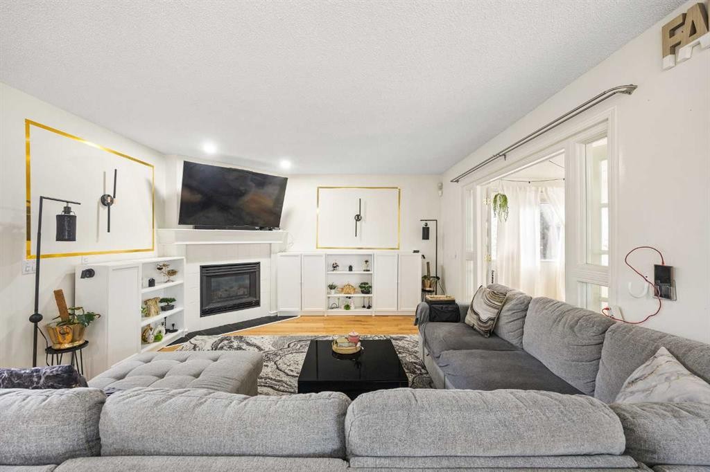 58 Citadel Crest Circle Nw, Calgary, AB - Indoor Photo Showing Living Room With Fireplace