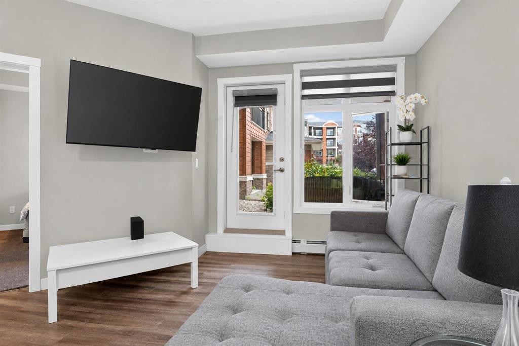 2115-3727 Sage Hill Drive Nw, Calgary, AB - Indoor Photo Showing Living Room