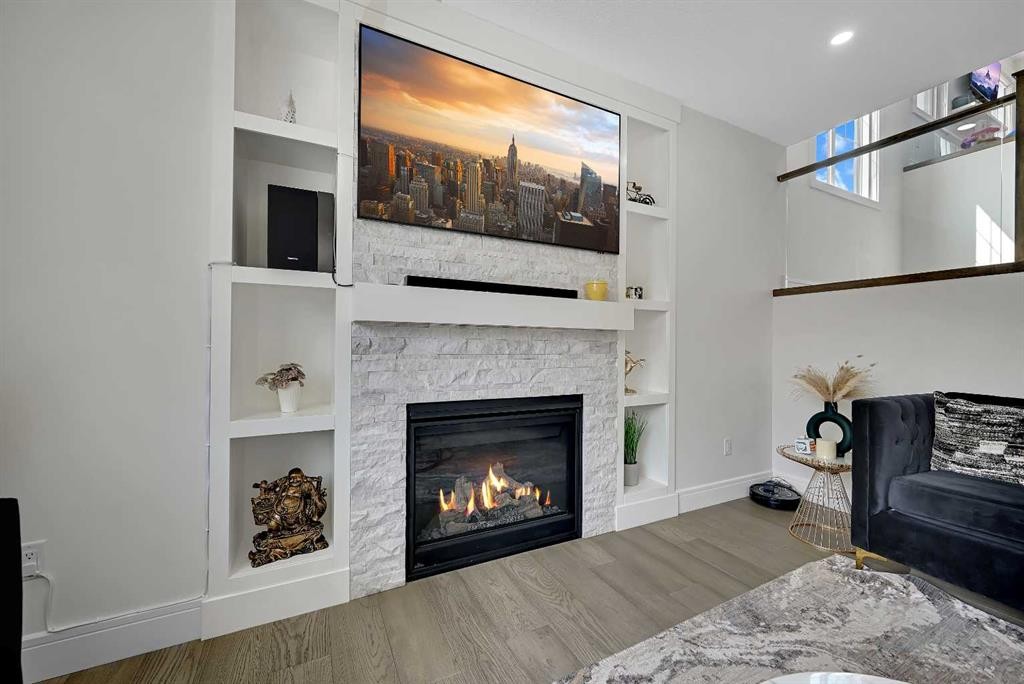 70 South Shore Bay, Chestermere, AB - Indoor Photo Showing Living Room With Fireplace