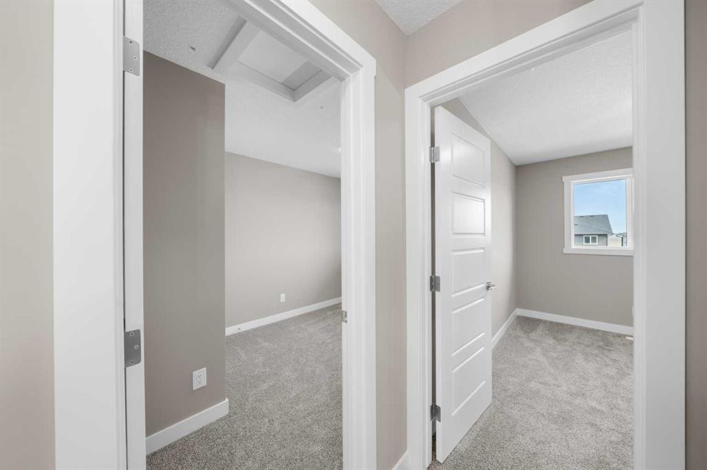 94 Sora Gardens Se, Calgary, AB - Indoor Photo Showing Other Room