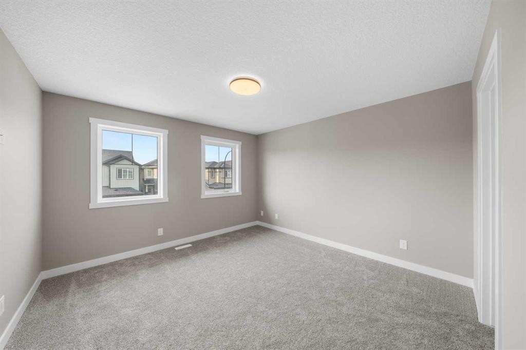 94 Sora Gardens Se, Calgary, AB - Indoor Photo Showing Other Room